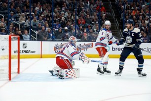Boone Jenner beats Igor Shesterkin for one of his three goals in the Rangers' 5-3 loss to the Blue Jackets.
