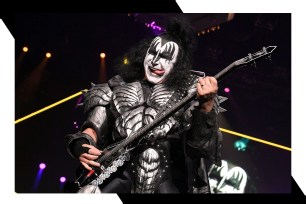 Gene Simmons rocks out with his tongue out.