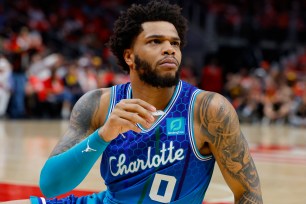 Miles Bridges #0 of the Charlotte Hornets reacts after a foul is called during the first half against the Atlanta Hawks at State Farm Arena on April 13, 2022 in Atlanta, Georgia.
