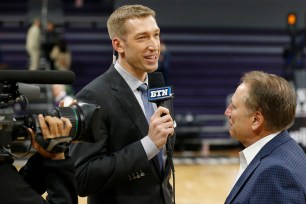 Robbie Hummel of the Big Ten Network interviews Head coach Tom Izzo of the Michigan State Spartans at Welsh-Ryan Arena on December 18, 2019 in Evanston, Illinois.
