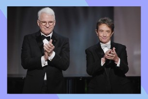 (L-R) Steve Martin and Martin Short perform together in suits.