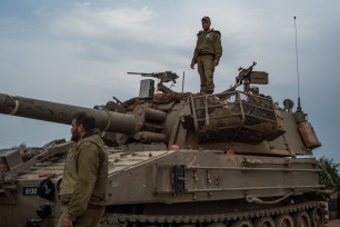 Israeli artillery forces are deployed near the Israel-Gaza border.