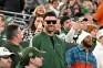 Travis Kelce sports pricey green tracksuit to cheer on Eagles without Taylor Swift